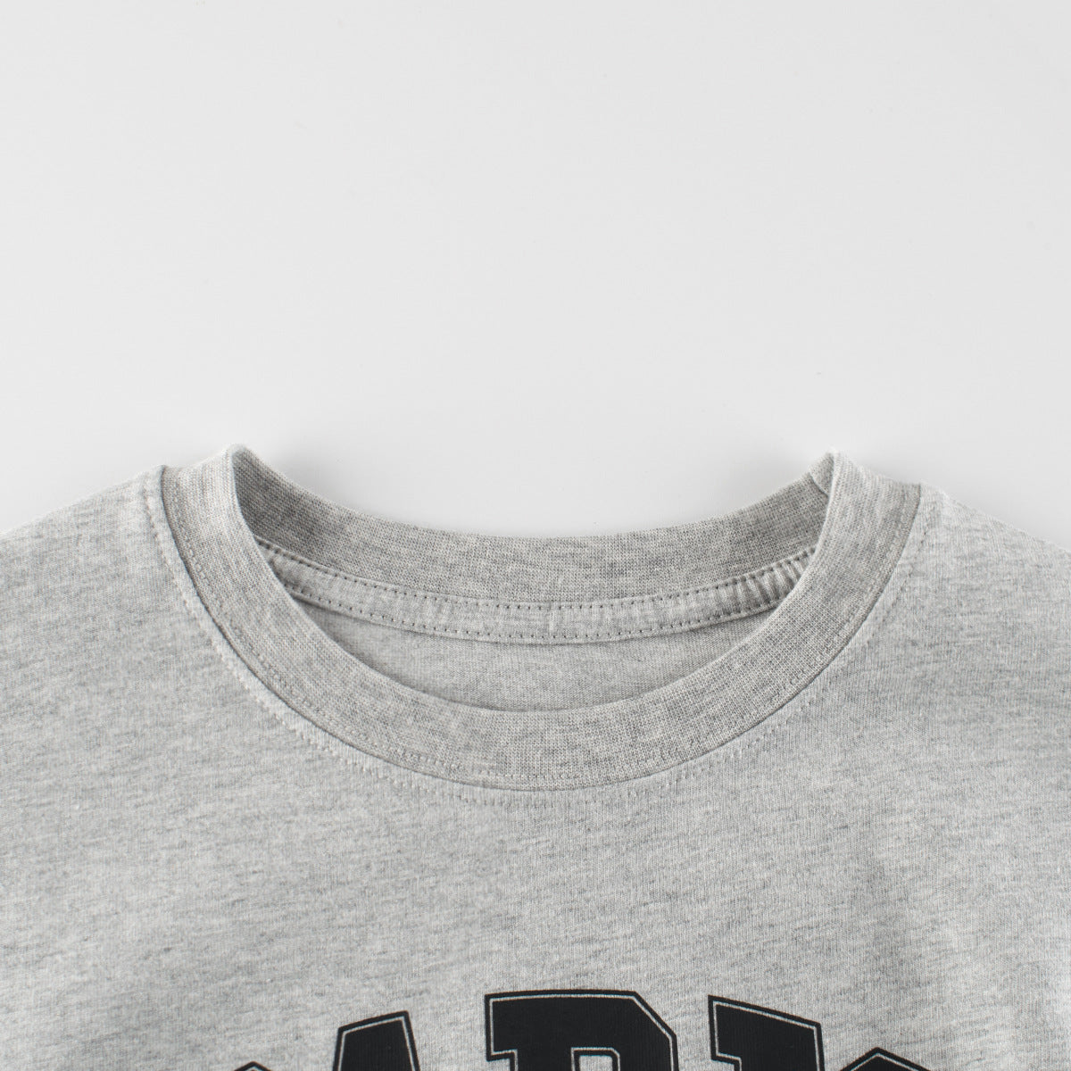 Boys and Girls’ Letters Print T-shirt in European and American Style